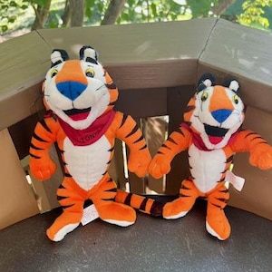 Tony the Tiger, Two sizes, Frosted Flakes Cereal, Like New, They're  GRRREEEAATT!
