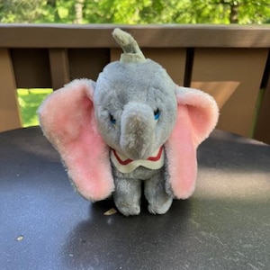 Vintage 1980&#39;s plush Dumbo, Made by Disney, Marked Walt Disney Prod, ground nuts in bottom