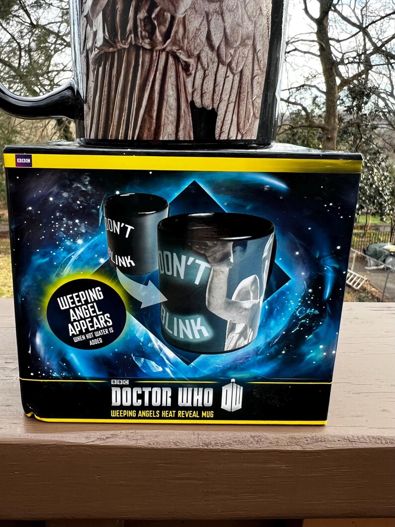 May include: A black Doctor Who Weeping Angels heat reveal mug with the words "Don't Blink" on the side. The mug's packaging features the text "Weeping Angel Appears When Hot Water Is Added."