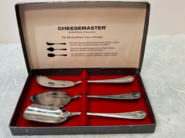 4 piece Regent Sheffield Cheese Knife Set Plastic Marbled Style Handles