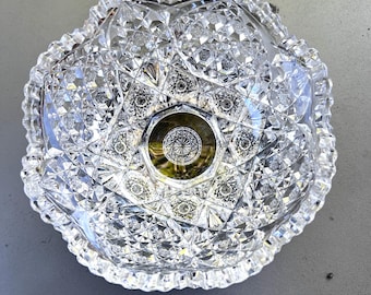 American Brilliant period crystal bowl. 8 inches. Scalloped wave with sawtooth edge.