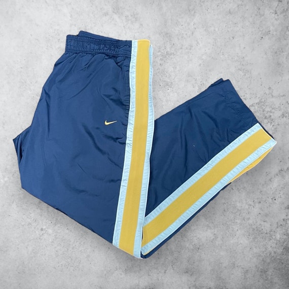 yellow and navy blue nikes