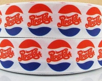 May include: White ribbon with a repeating pattern of red, white, and blue Pepsi-Cola logos.