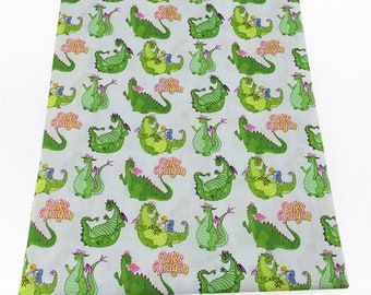 May include: A light gray fabric featuring a repeating pattern of green cartoon dragons with pink wings and the text Pete's Dragon in pink and yellow lettering. The design shows the dragon in various poses, some with a small character on its back.