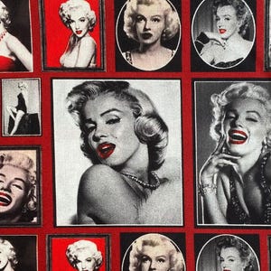 May include: A red and black fabric with a repeating pattern of black and white images of Marilyn Monroe. The images are in various poses and expressions.