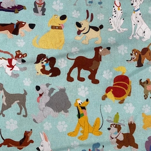 May include: A teal fabric with a repeating pattern of cartoon dogs. The dogs are in various poses and breeds, including Dalmatians, a golden retriever, a basset hound, and a poodle.