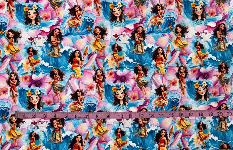 May include: Fabric with a repeating pattern featuring cartoon characters in a tropical setting. The design includes images of women, flowers, and ocean waves in shades of blue, pink, and yellow. The fabric is suitable for various crafting projects.