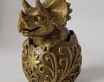 Cría de Triceratops en huevo - Lasca de bronce con acabado bruñido