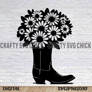 May include: Black silhouette of a cowboy boot with a bouquet of white daisies in the top of the boot.
