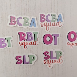 May include: Seven colorful stickers with text that reads "BCBA squad", "RBT squad", "OT squad", "SLP squad", "BCBA", "RBT", and "OT".