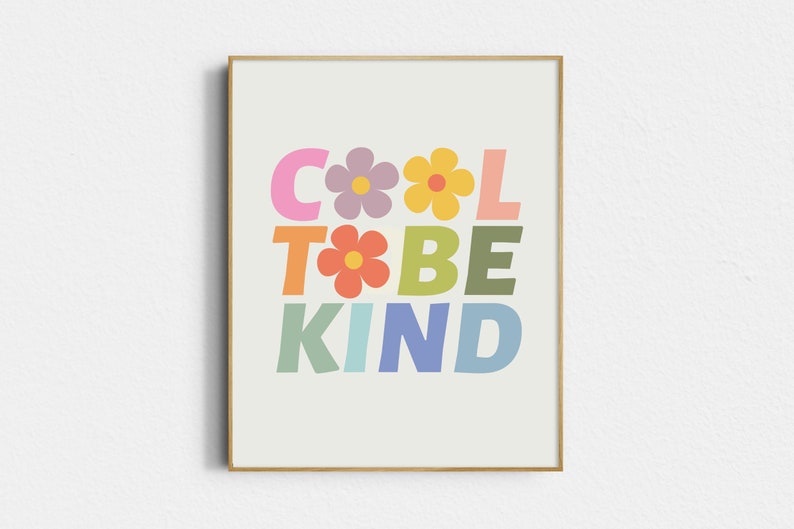 May include: A framed print with the text "COOL TO BE KIND" in colorful letters with flowers between the words.