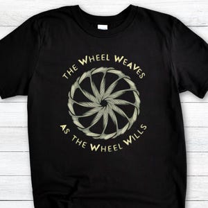 Wheel Weaves Robert Jordan Tee, Unisex T-Shirt Fan Gift, The Wheel Wills Graphic Shirt, Softstyle Tee, Wheel of Time Quote Apparel