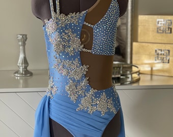 Made sto order 4-6 weeks Beautiful periwinkle one shoulder costume with tons of crystals. Stunning Appliqués and skirt