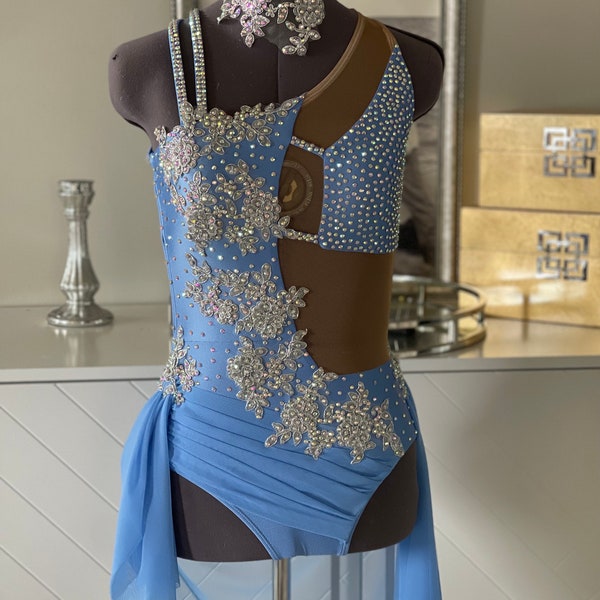 Made sto order 4-6 weeks Beautiful periwinkle one shoulder costume with tons of crystals. Stunning Appliqués and skirt