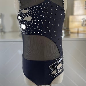 Child small competition costume with beautiful mirror appliqués and crystals