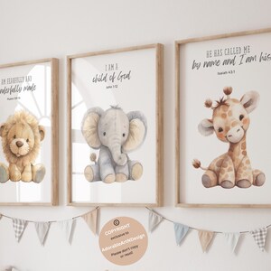 May include: Three framed prints with watercolor illustrations of a lion, elephant, and giraffe. Each print features a bible verse. The lion print says "I am fearfully and wonderfully made." The elephant print says "I am a child of God." The giraffe print says "He has called me by name and I am his."
