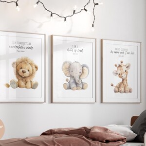 May include: Three framed prints with watercolor illustrations of a lion, elephant, and giraffe. Each print features a Bible verse: "I am fearfully and wonderfully made", "I am a child of God", and "He has called me by name and I am His".