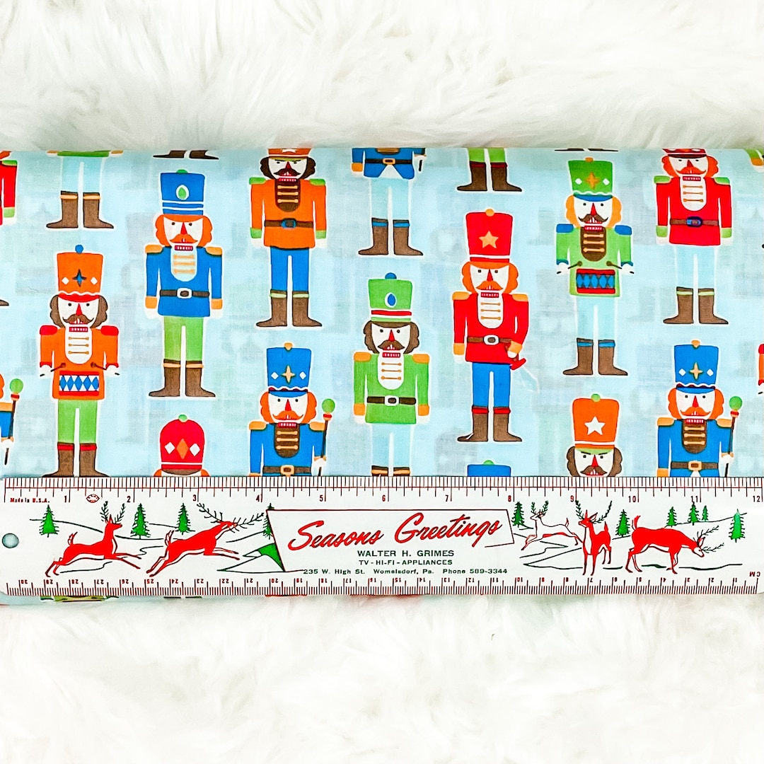 Vintage Inspired Christmas Nutcrackers Fabric on Light Blue. Rare and Out of Print. Lecien