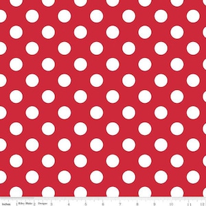 May include: Red fabric with a repeating pattern of large white polka dots. The dots are evenly spaced across the surface. The fabric has a smooth texture and is suitable for various sewing and crafting projects.