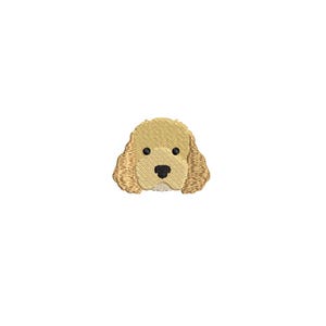 May include: Embroidered patch featuring a golden retriever dog's head. The dog has black eyes and a black nose, with tan fur and floppy ears. The patch is likely for sewing onto clothing or accessories.