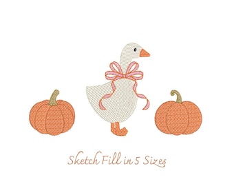 May include: An embroidery design featuring a central white goose with an orange beak and feet, wearing a pink and orange bow around its neck, flanked by two orange pumpkins with brown stems. The text below reads Sketch Fill in 5 Sizes.