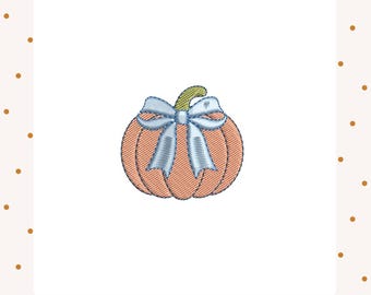 May include: Embroidered pumpkin with a light orange body, a green stem, and a light blue bow. The pumpkin has detailed stitching and is set against a white background with a dotted border. Ideal for autumn-themed crafts.