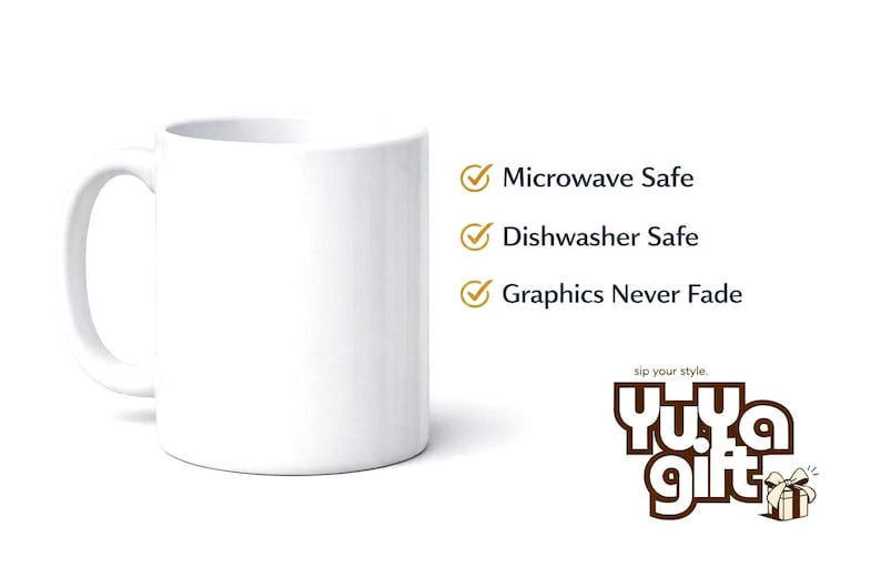 May include: A white ceramic mug with a curved handle. Text on the right side of the mug reads "Microwave Safe", "Dishwasher Safe", and "Graphics Never Fade". The mug has the logo "Yu.Ya Gift" at the bottom.
