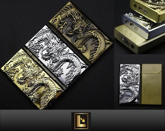 May include: Three lighters in different colours, each featuring an embossed dragon design. The lighters are gold, silver and bronze.