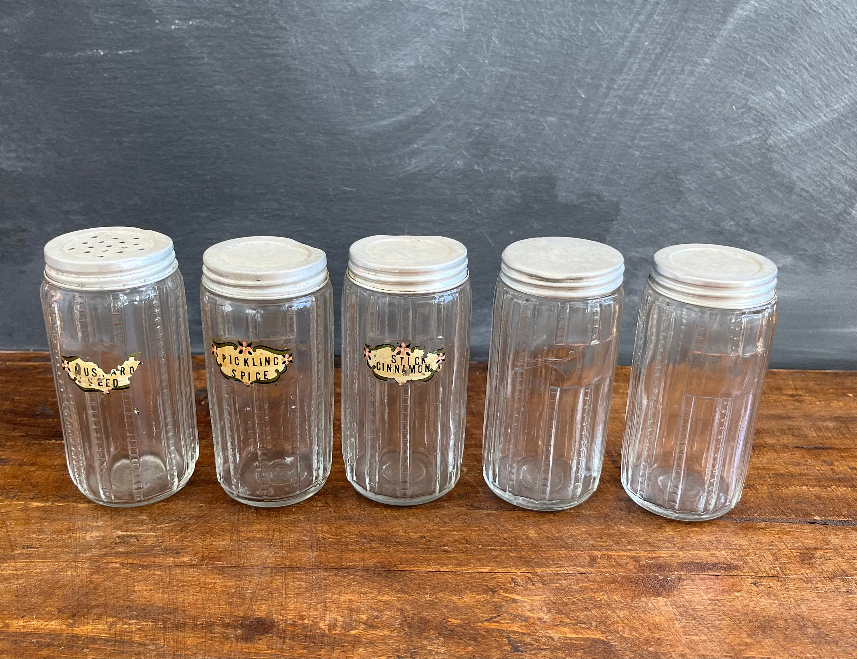 craft supplies storage or spice jars, old glass bottles with metal