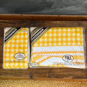 May include: Two packages of yellow and white checkered no-iron muslin fabric. One package is for two standard pillowcases, measuring 20 x 26 inches, with a finished size of 20 x 30 inches. The other package is for a full flat sheet, measuring 54 x 75 inches, with a finished size of 81 x 96 inches.