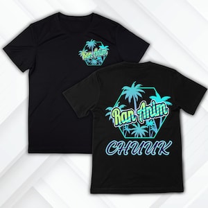 May include: Black t-shirts with a tropical design. The front of the shirt has a small hexagon logo with palm trees and the text "Ran Anim". The back of the shirt has a larger version of the logo with the word "CHUUK" below it.