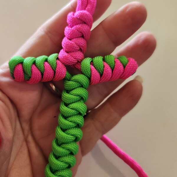 Neon green and Hot pink paracord cross necklace.