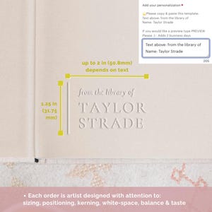 May include: A close-up of a white embossed text on a light pink background. The text reads "from the library of TAYLOR STRADE". The text is approximately 1.25 inches (31.75 mm) tall and up to 2 inches (50.8 mm) wide.