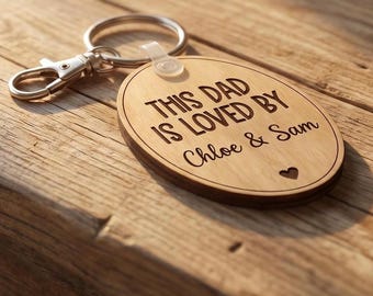Personalized Birch Wood Keychain – Custom Engraved "Dad Is Loved By" Gift