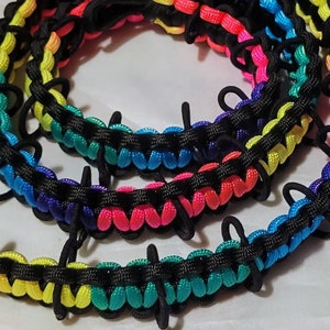 Neon Rainbow paracord DUCK WRANGLER rubber duck holder for jeeps.