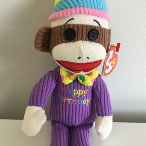 Ty Beanie Baby Sock Monkey: 'Grattis på födelsedagen' plyschleksak..(20 cm lång)..