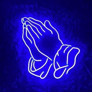 May include: A neon blue sign in the shape of two hands clasped together in prayer.
