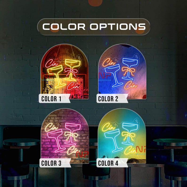 Pu&ograve; includere: Un'insegna al neon con quattro opzioni di colore. Ogni opzione presenta due bicchieri da martini con un fiocco e la parola "Cin". Le opzioni di colore sono rosso, blu, rosa e verde acqua.