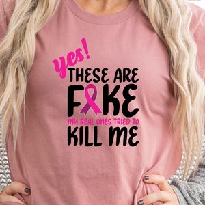 Yes These Are Fake My Real Ones Tried To Kill Me Shirt, Breast Cancer Awareness Shirt, Breast Cancer Shirt, Pink Ribbon Shirt Gift