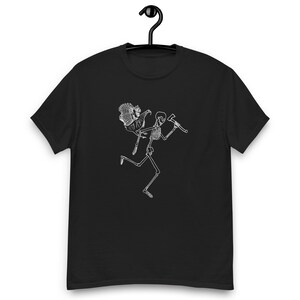 May include: A black t-shirt with a white graphic of a skeleton holding a turkey and an axe.
