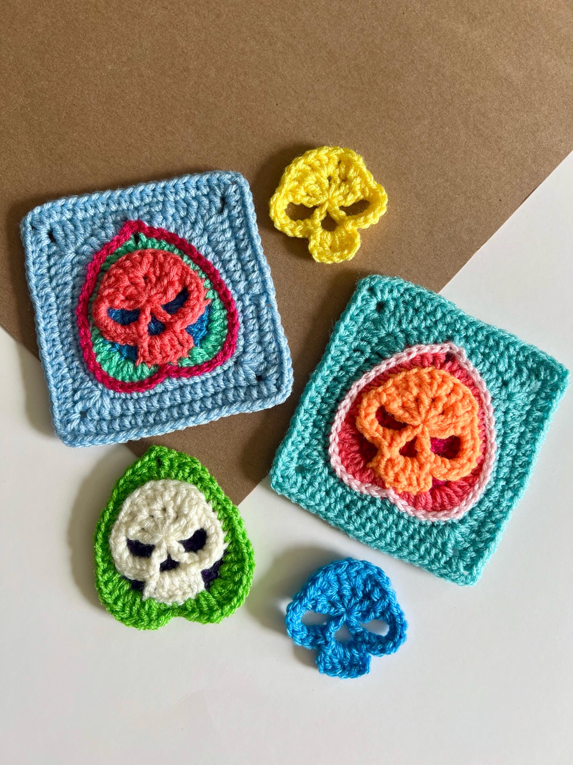 25 Skull Granny Square Crochet Patterns for Halloween, Gothic Decor, and Clever Motifs 6 Crochet Skull Granny Square Pattern: Mystic Planchette