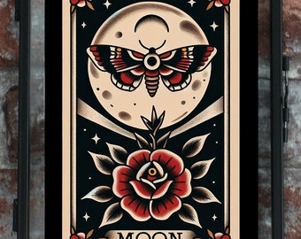 May include: A tarot card with a black background and a cream colored border. The card depicts a full moon with a moth in front of it. Below the moon is a red rose with green leaves. The card is labeled "8 MOON".