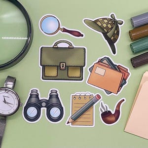 May include: A collection of detective-themed stickers featuring a magnifying glass, a deerstalker hat, a briefcase, file folders, binoculars, a notepad with a pencil, and a smoking pipe, arranged alongside a magnifying glass and a wristwatch.