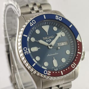 Vintage Seiko 5 Sport automatisk dykarklocka, blå urtavla, Pepsi-infattning, servad