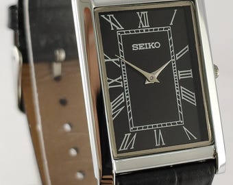 Vintage Seiko Tank Style Quartz Black Dial Roman Index Rectangle Men's Wristwatch