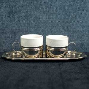 Two Small Vintage Coffee Cups • Italian tête-à-tête espresso coffee set. Porcelain white small cups in metal holders & small elongated tray