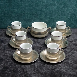 Set da caffè italiano vintage. Porcellana Monopoli e portatassse e piattini in argento, zuccheriera nel supporto 2 manici. Set da 20 pezzi