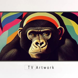 May include: A close-up of a gorilla's face against a colourful abstract background. The gorilla has a serious expression and is wearing a headband with orange, red and white stripes.