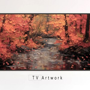 May include: A painting of a forest stream with fall foliage in shades of orange and red. The water is calm and reflects the trees. The painting is framed in black.