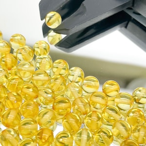Baltischer Bernstein lose rund 6,5 mm Lemon Perlen